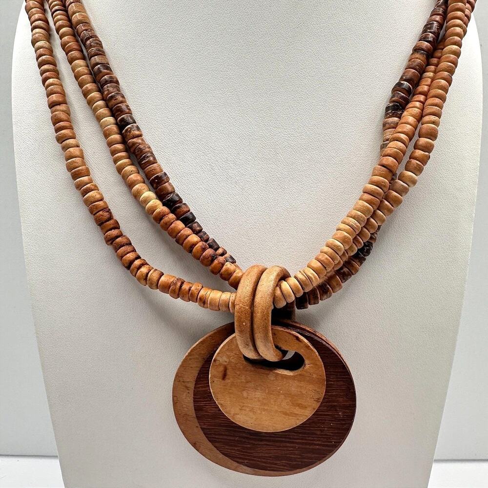 Vintage 80s Multi-strand wooden bead necklace with two circular pendants jewelry